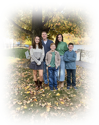 Worthington dentist Dr. LJ Adam with his wife and three kids